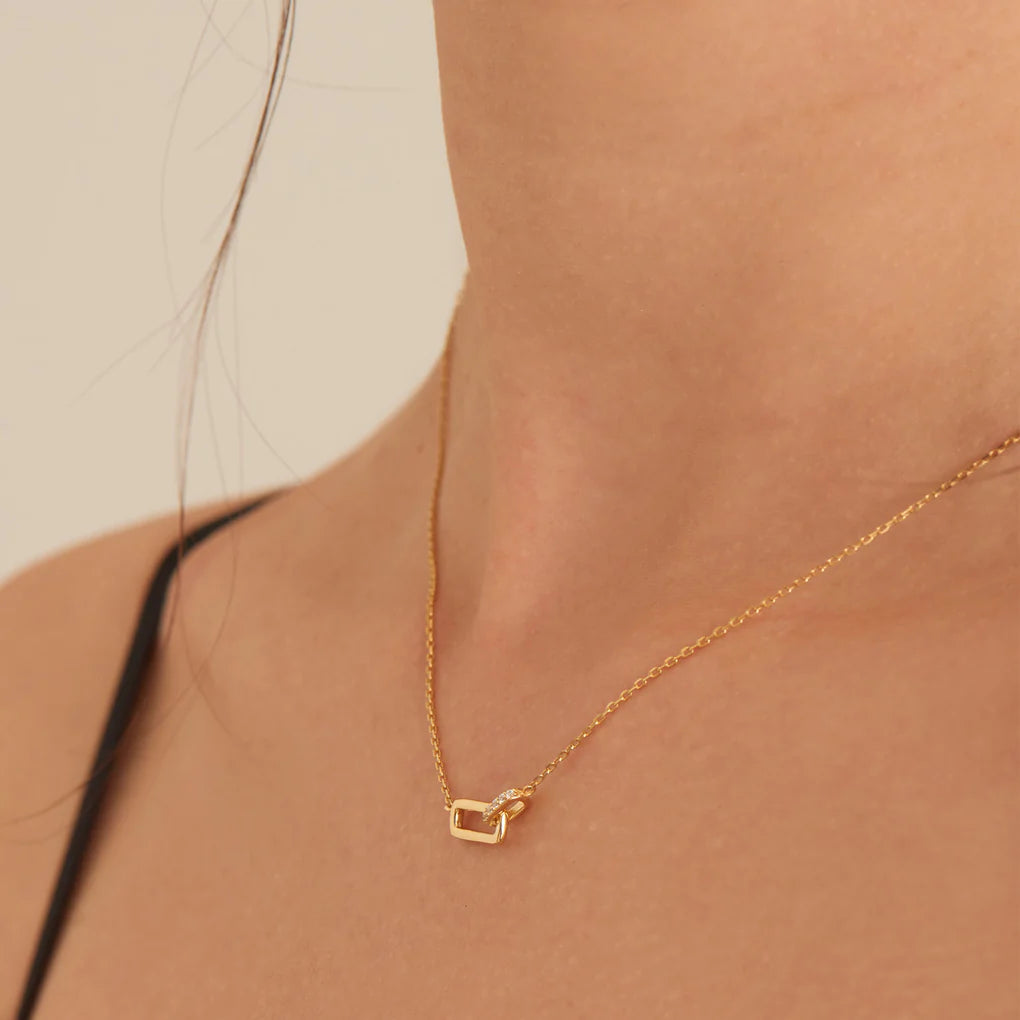 gold glam interlock necklace