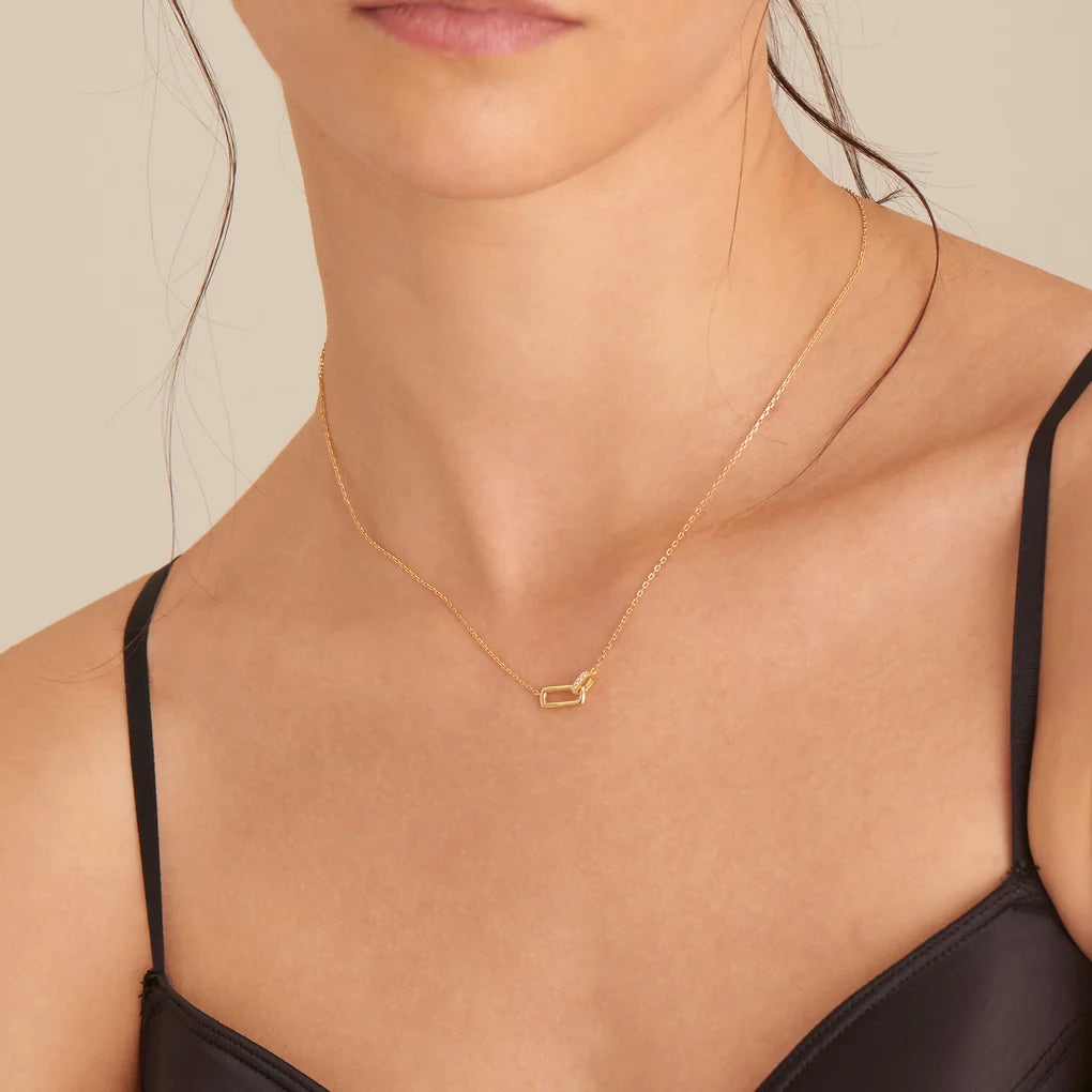 gold glam interlock necklace