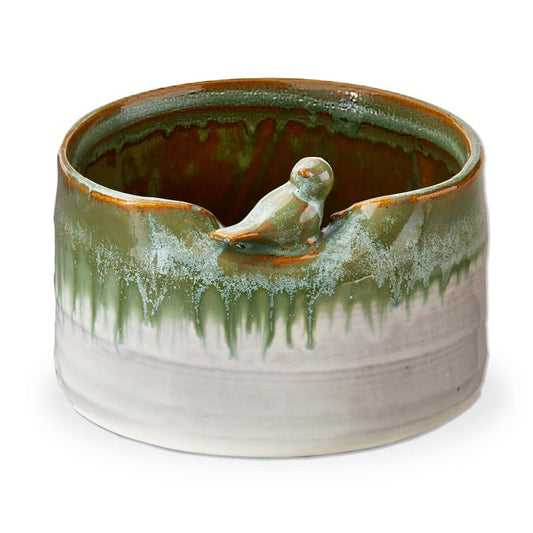 sitting bird planter